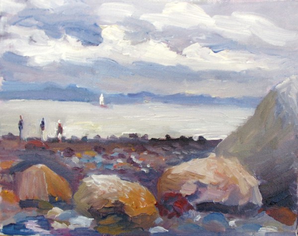 View of the ocean framed by big rocks