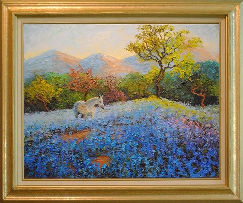 White horse and bluebonnets.