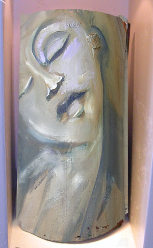 face on a roof tile