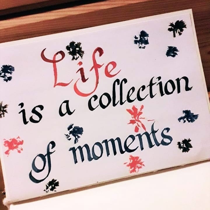 Life is a collection of moments Written in Italic script