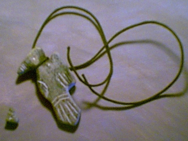 Carved Indian Bird and Tiny Howling Wolf