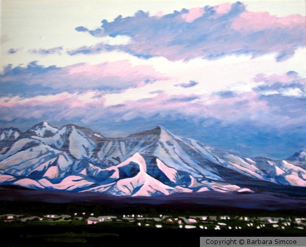 Sunset on snowy mountains
