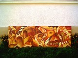 by  