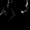 Silhouette of a Woman Smoking
