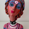 Woman clay bought and acrylic painted 