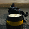 Man Eating at Barrel