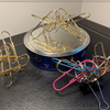 18 Giant Metal Paper Clips and a Tin of Butter Biscuits
