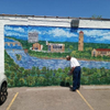 Artist finished work at Cecils Deli...
