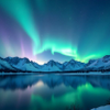 Stunning vibrant northern lights glowing brightly above snow covered mountain lake peaks