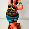 Woman clay sculpture that I bought and painted with acrylic color. Mirit Ben-Nun Israeli artist.