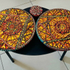Living room table with artwork pasted on it by Mirit Ben-Nun