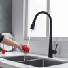 black kitchen mixer tap with pull out spray handle