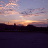 sunset and abandoned building